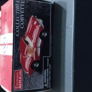 1957 Corvette die-cast red with a white pen strip 1/43 scale